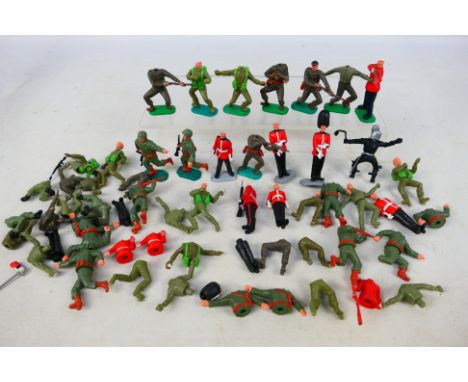 Timpo - An unboxed unit of Timpo Swoppet style mainly British Infantry figures. The figures are in a variety of poses, and ap