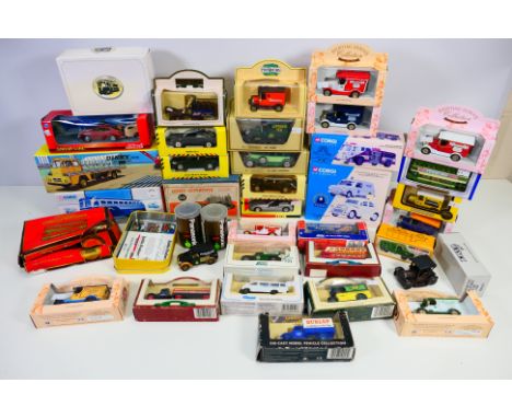 Corgi - Dinky Atlas - Lledo - A collection of boxed and carded vehicles including Saviem Pipe Truck # 885, Stockport Borough 