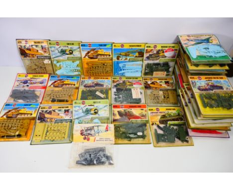 Airfix - A group of 39 carded 1:72 and HO/OO scale plastic model kits from Airfix. Lot includes Airfix #01047-2 Fiesler Storc