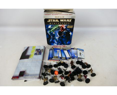 Star Wars Miniatures - Wizards of the Coast - A group of approximately 30 Star Wars Miniature figures with a quantity of card