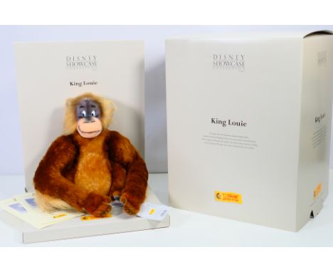 Steiff - Disney - A boxed Disney Showcase King Louie # 680274 . He is approximately 25 cm tall with gold button ear tag and s