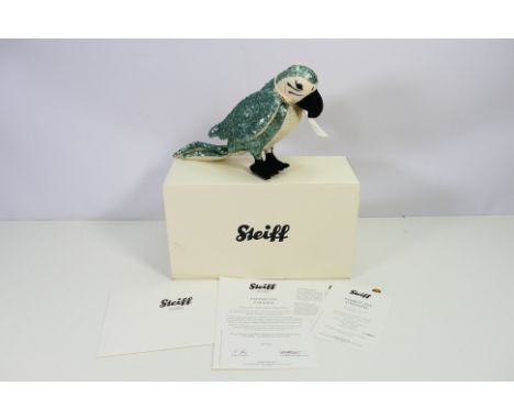 Steiff - A boxed limited edition Parrot Ava Paradise number 358 of only 2000 made in 2013. The bird appears in Mint condition