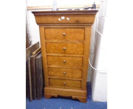A TALL LIGHT OAK CHEST, of five drawers