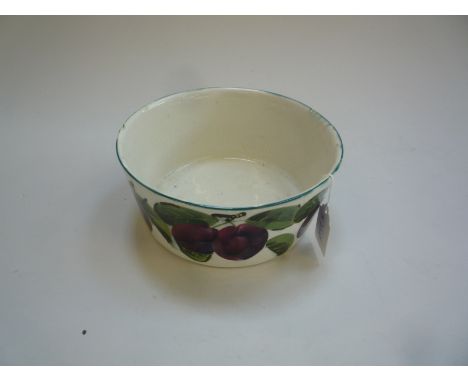A WEMYSS POTTERY DOG BOWL, painted with plums, inscribed 'Qui aime Jean, aime Son Chien', impressed and painted marks, 'Wemys