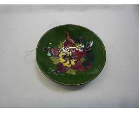 A MOORCROFT POTTERY TRINKET DISH, Columbine design, impressed marks (restorations)