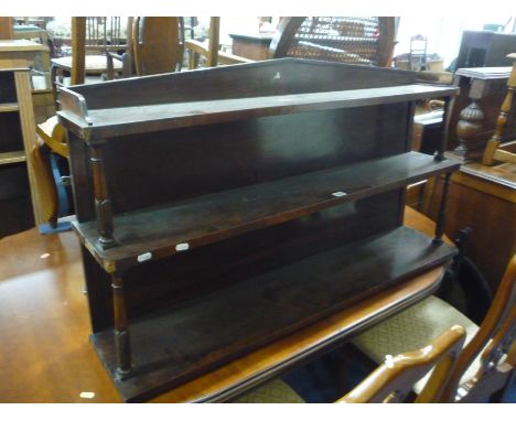 A 19TH CENTURY ROSEWOOD THREE TIER HANGING WALL SHELF