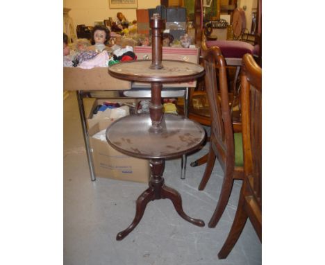 A 19TH CENTURY MAHOGANY THREE TIER DUMB WAITER/BUFFET, on tripod support (s.d. top tier missing etc) (for restoration)