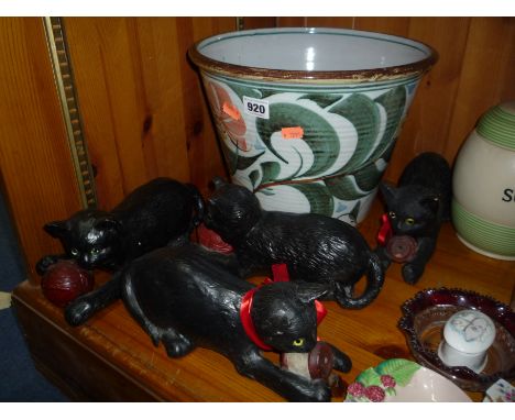FOUR BRETBY CATS, two playing with cotton reels and two playing with ball of wool, and a jardiniere (5)