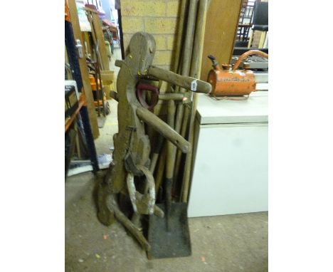 A VINTAGE DOUBLE YOKE, and a quantity of garden tools