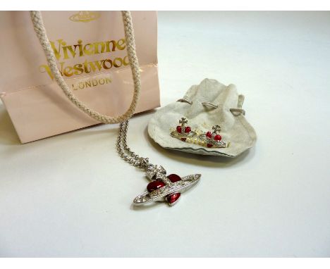 VIVENNE WESTWOOD - A NECKLACE AND PAIR OF EARRINGS, with heart shape orb with red enamel and diamante detail to the long belc