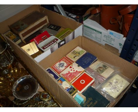 TWO BOXES OF BOXED AND UNBOXED PLAYING CARDS, CARD GAMES, SMOKING RELATED ITEMS, etc