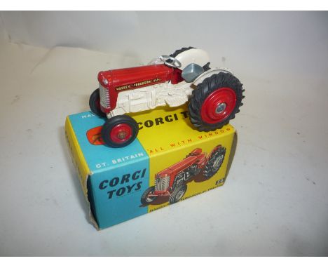 A BOXED CORGI TOYS MASSEY-FERGUSON 65 TRACTOR, No.50, version with plastic hubs and steering wheel, minor wear to box