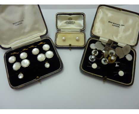 A COLLECTION OF BUTTON AND STUDS, to include a set by Harrods of London of mother of pearl dress studs together with assorted