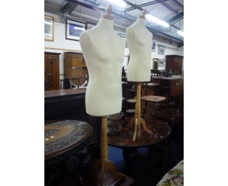 TWO MALE TORSO SHOP WINDOW MANNEQUINS, on tripod supports