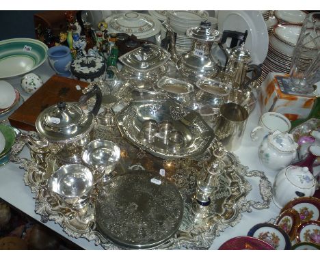 A QUANTITY OF PLATED WARES, to include four piece tea service, trays, coasters etc