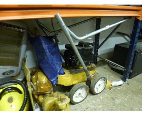 A PETROL GARDEN VACUUM/SWEEP, (no grass box)