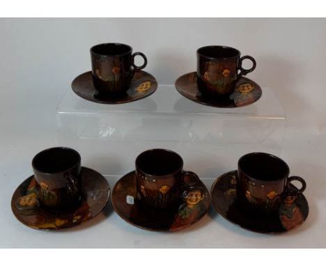 Set of Royal Doulton Kingsware coffee cups & saucers decorated with Dickens Artful Dodger scenes  (one cup cracked and one sa