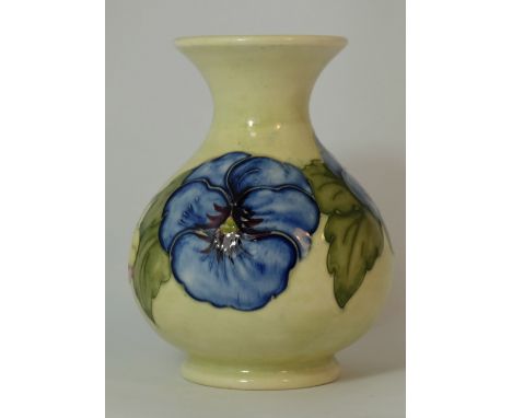 Moorcroft vase decorated with Pansies on light green ground, height 14cm