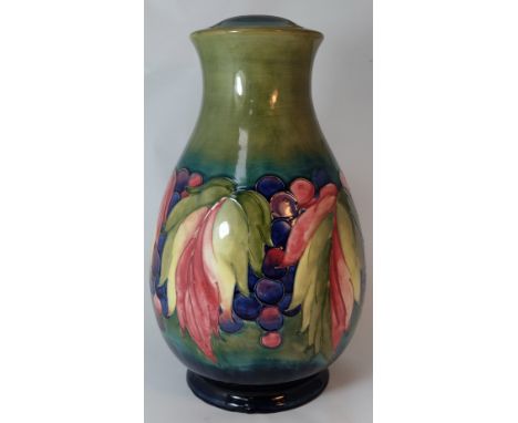 Moorcroft large lamp base decorated in the Leaf & Berry design, height 41cm