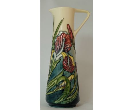 Moorcroft Jug decorated with flowers, Collectors club piece 1995, height 24cm