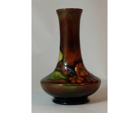 Moorcroft flambe vase decorated in the Orchid design, height 16cm