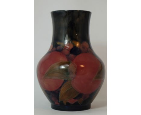 Moorcroft vase decorated in the Pomegranate design, height 18cm  (restored) 