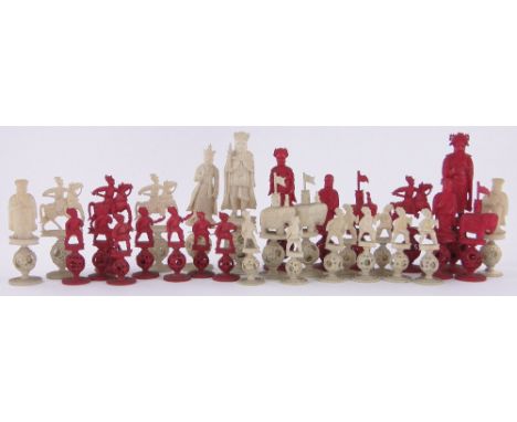 A 19th century Chinese red and white ivory puzzle ball chess set,the major pieces depicting European Royalty, King height 14c