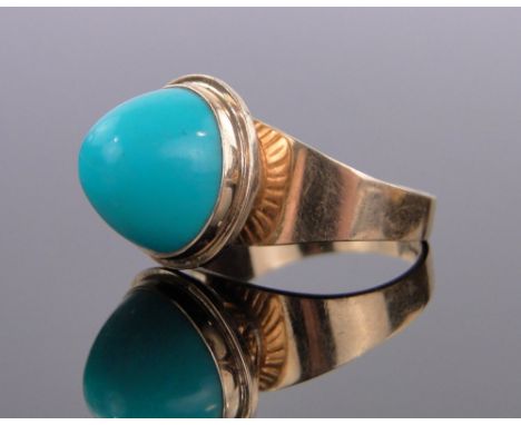 A continental 18ct gold dome shaped turquoise set ring,makers marks J P, setting width 14mm, size M.