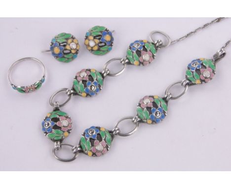 A suite of Bernard Instone silver and enamel jewellery,comprising bracelet, ring and pair of earrings.