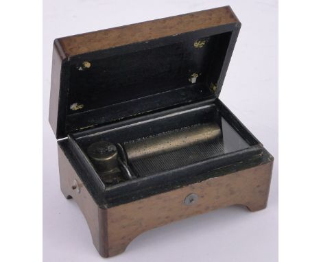 A 19th century miniature maple cased musical box,playing on a 7cm cylinder, case length 12.5cm, working order.