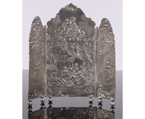 A late 19th century Dutch silver 3-fold dolls house firescreen,with relief cherubs and garden scene, import marks London 1898