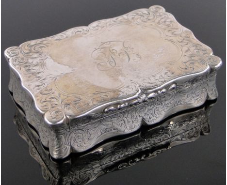 A Victorian rectangular silver snuff box,with shaped surround, concave sides and engraved acanthus decoration by Edward Smith