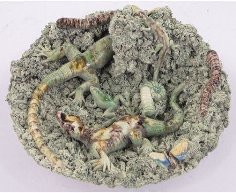 A Portuguese Palissy style glazed ceramic dish,with lizards, frogs and worms, diameter 28cm.