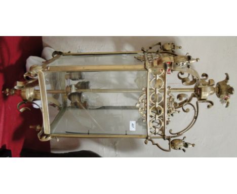 A large brass framed 4 glass lantern light fitting,height 95cm.