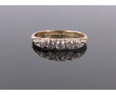 An 18ct gold 5 stone diamond ring,size O.