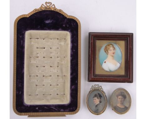 A jeweller's ring display pad,with ribbon gilt metal surround, height 27cm together with 3 miniature portrait prints, (4).