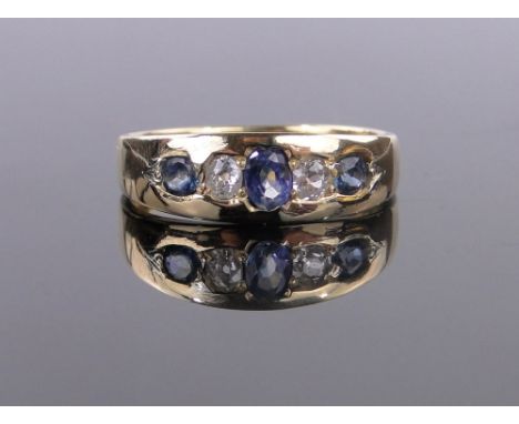 A Victorian 18ct gold sapphire and diamond 5 stone ring,dated 1880, size M.