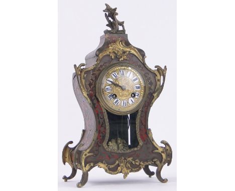 A French boulle marquetry balloon cased mantel clock circa 1900,with cast gilt metal mouldings and mounts and enamelled numer
