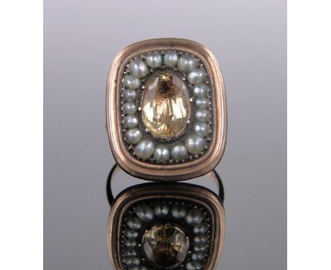 An unmarked gold citrine and pearl set panel ring,setting height 20mm, size J.