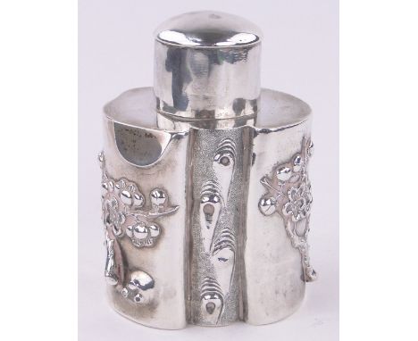 A Chinese silver tea caddy circa 1900,with relief decorated blossom tree surround, indistinct marks under base, height 12cm, 