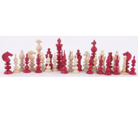 A 19th century red and white stained ivory part chess set,King height 8.5cm (29 pieces).