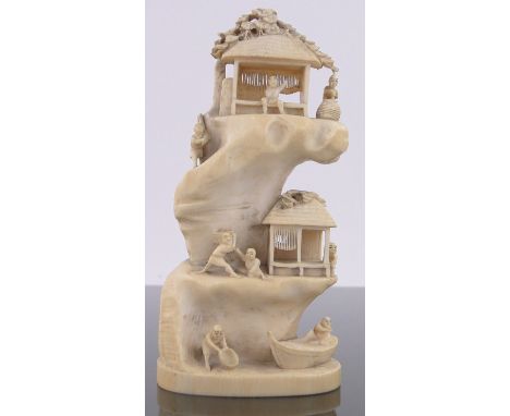 A 19th century Chinese ivory ornamental fishing village,with figures and boat, signed with lacquer seal under base, height 13