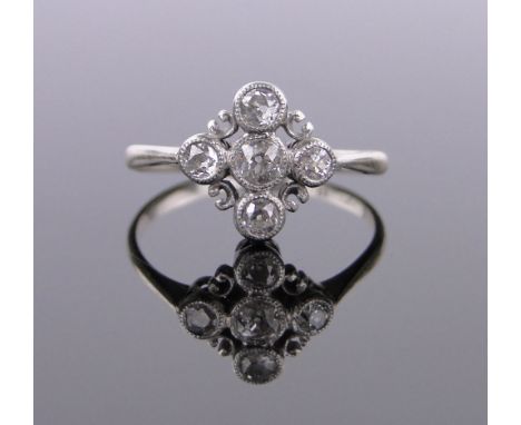 A 5 stone diamond set open work panel ring,18ct white gold and platinum settings, setting height 11mm, size N.