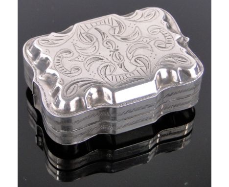 An ornate Dutch silver snuff box,with engraved lid and continental marks, length 6cm.