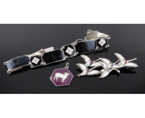 An Erik Magnussen silver and enamel brooch,a black and white enamel and silver bracelet and a pendant, (3).