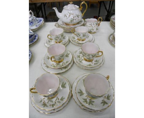A ROYAL ALBERT PALE PINK AND WHITE TEA SERVICE DECORATED WITH STYLISED LEAVES, PRINTED MARK 