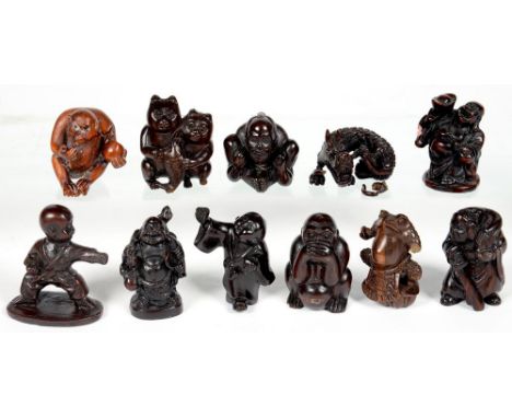 ELEVEN JAPANESE CARVED WOOD NETSUKE, VARIOUS SIZES, 20TH C