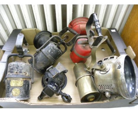 A POWELL AND HANMER NICKEL PLATED BRASS HAND LANTERN, A CRESTELLA PREMIER LAMP RED PAINTED HAND LANTERN, TWO OTHERS SIMILAR A