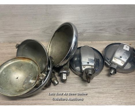 SELECTION OF VINTAGE AUTOMOTIVE HEADLIGHT HOUSINGS, MAINLY LUCAS