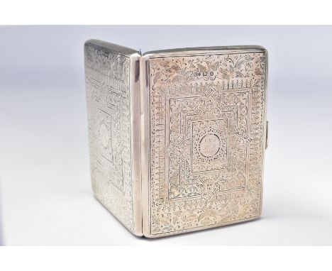A LATE VICTORIAN SILVER CARD CASE OF RECTANGULAR FORM, foliate and geometric engraved decoration to front and back, one carto